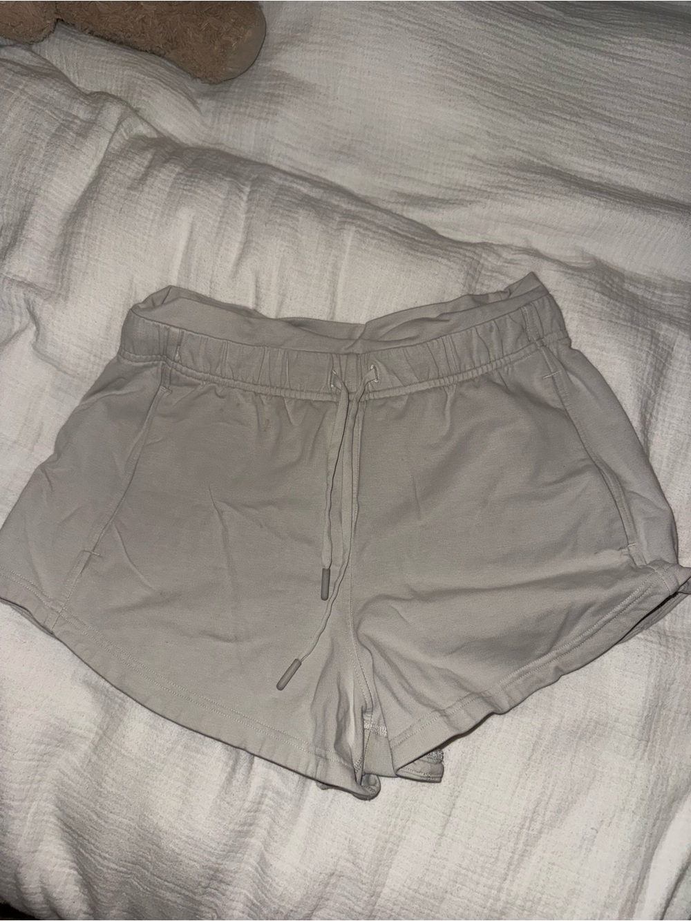 lululemon inner glow high rise shorts in bone